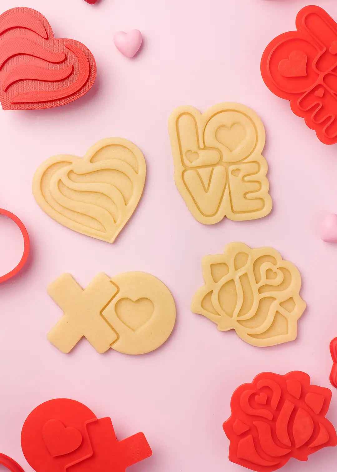 Perfectly cut out dough in the shape of hearts, roses, and love messages, perfect for expressing love. 