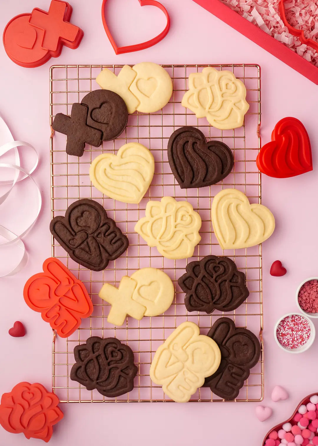 Romantic Valentine's cookies with intricate heart and rose designs, ready to be gifted to a loved one.