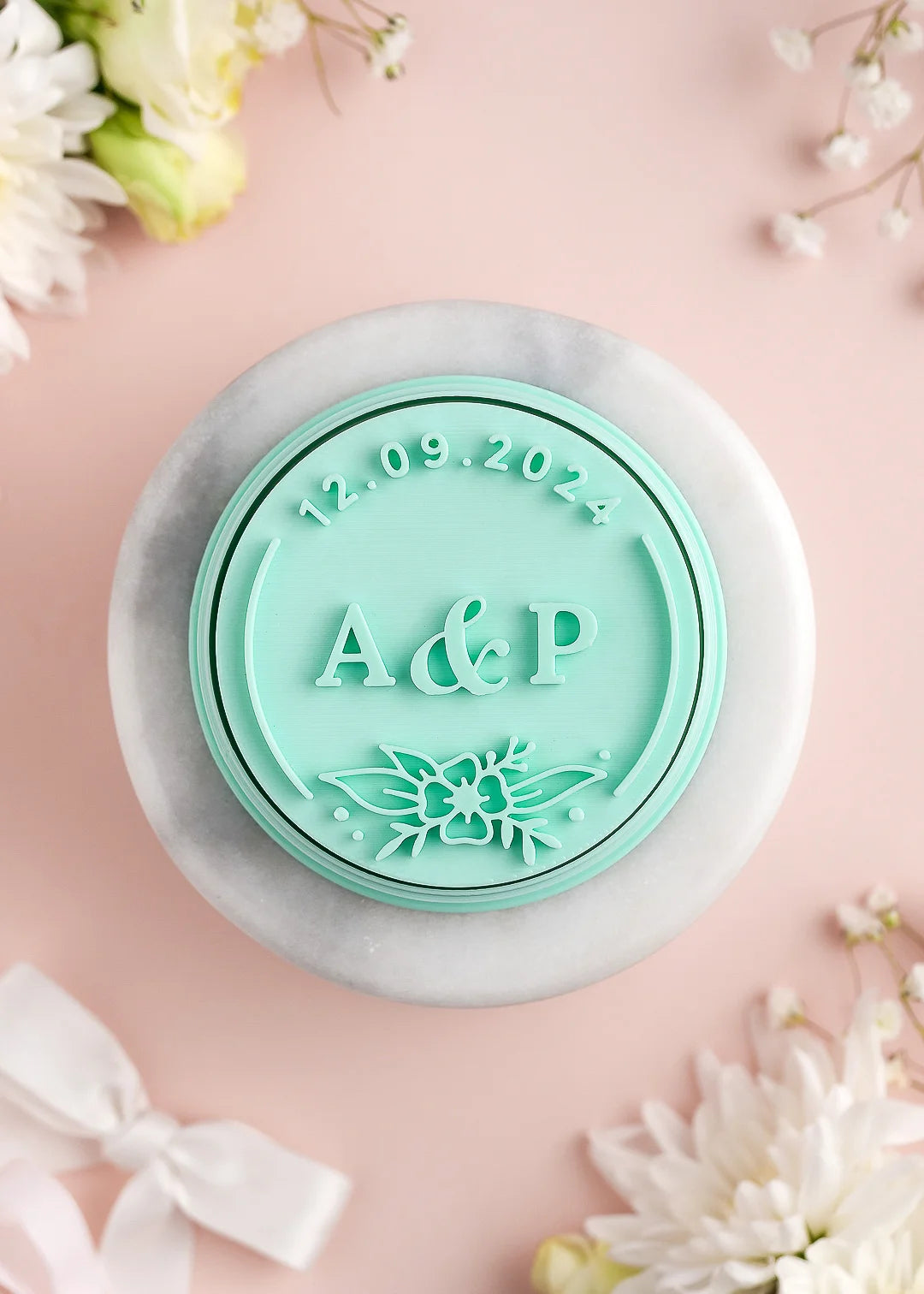 Round wedding cookie stamp with frame and flower bouquet, custom initials and date. Example: A&P; 12.09.2024