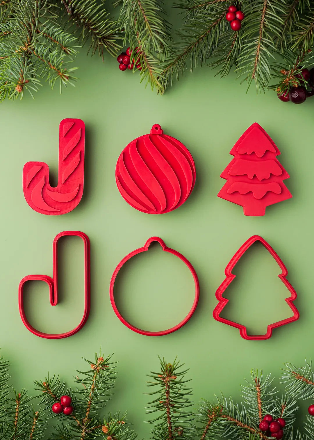 Set includes: 3 Christmas cookie stamps - candy cane, ornament and Christmas tree, with 3 matching cookie cutters.